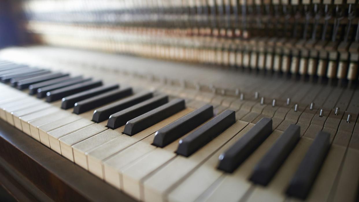 traditional upright piano keys close up