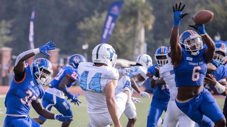 Savannah State's Marlon Jackson blocks a punt in the homecoming game. The play changed the game's momentum and sparked the Tigers' 28-14 victory.