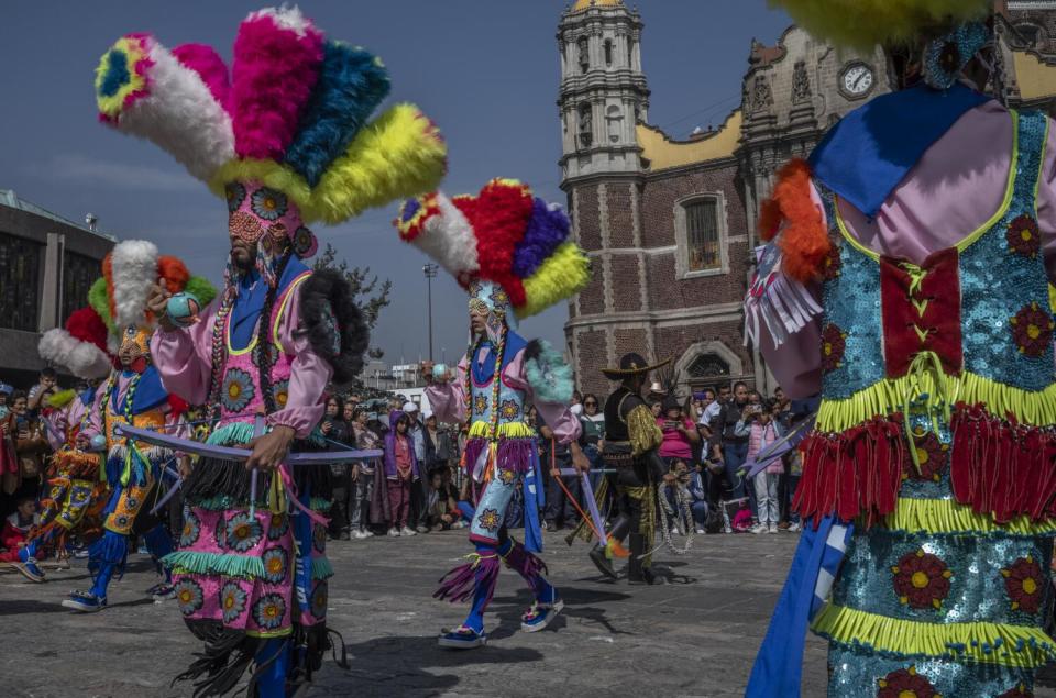 Dancers from Aguascalientes perform a traditional dance at the Basilica of Guadalupe on Dec. 12 in Mexico City.