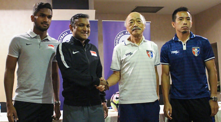Representatives from the Singapore and Chinese Taipei team shook hands at the pre-match press conference held at the Amara Hotel on Friday (9 June). (Photo: Nigel Chin/Yahoo Newsroom)