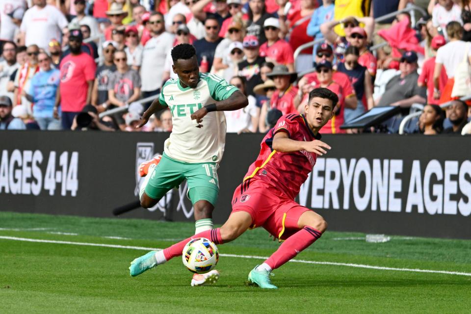 Austin FC forward Jader Obrian, left, and St. Louis City SC defender Anthony Markanich battle for the ball in the second half of Austin FC's 1-0 loss Sunday in St. Louis, Mo.