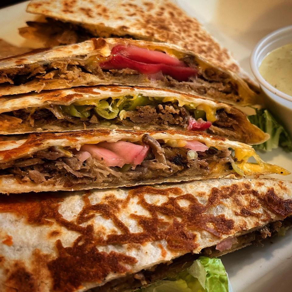 Dig into the Pulled Pork Quesadilla at  Sixes & Sevens.