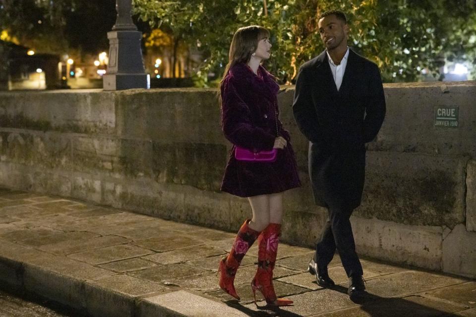 emily in paris l to r lily collins as emily, lucien laviscount as alfie in episode 309 of emily in paris cr marie etchegoyennetflix © 2022
