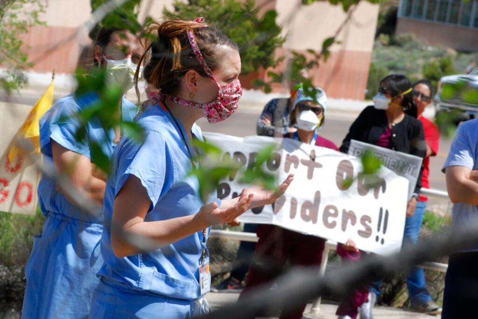 In this file photo taken May 8, 2020, medical staff from Rehoboth McKinley Christian Hospital hold a protest over working conditions and depleted staff in Gallup, N.M. New Mexico had a nursing shortage even before the pandemic and advocates are now trying to convince lawmakers to boost funding to increase capacity at the state's nursing schools.