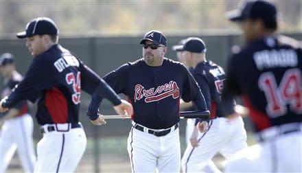 New Braves manager Fredi Gonzalez (center) is glad Chipper Jones is still around. "That's a big persona in that locker room."