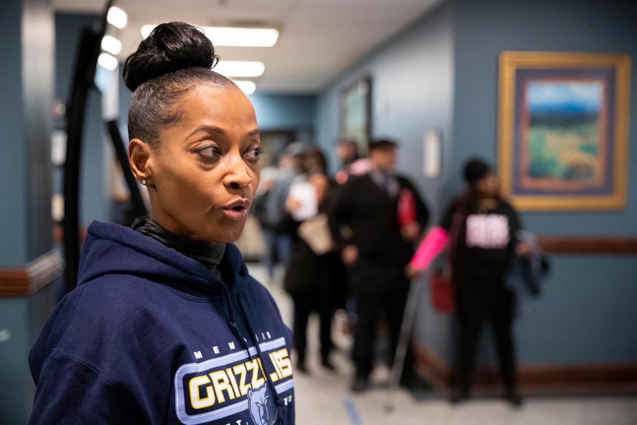 Shelby County Clerk Wanda Halbert stands next to a line of people waiting to be helped while giving a tour of the clerk’s office to The Commercial Appeal in Memphis, Tenn., on Friday, January 5, 2024.