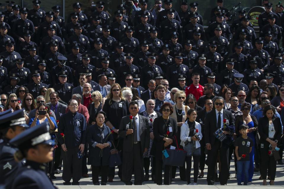 Family members of fallen officers assembled a memorial ceremony to honor the 238 LAPD officers killed in the line of duty