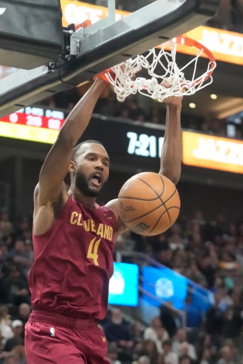 Cleveland Cavaliers forward Evan Mobley dunks against the Utah Jazz during the first half of an NBA basketball game Tuesday, April 2, 2024, in Salt Lake City. (AP Photo/Rick Bowmer)