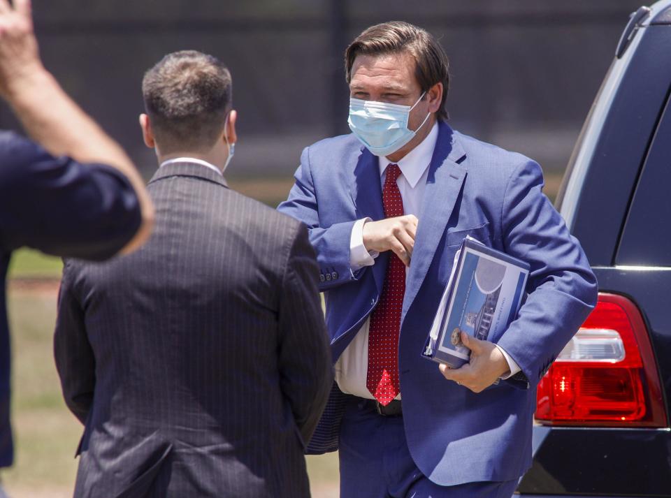 Gov. Ron DeSantis arrives May 8 at The Ballpark of the Palm Beaches in West Palm Beach for a news conference.