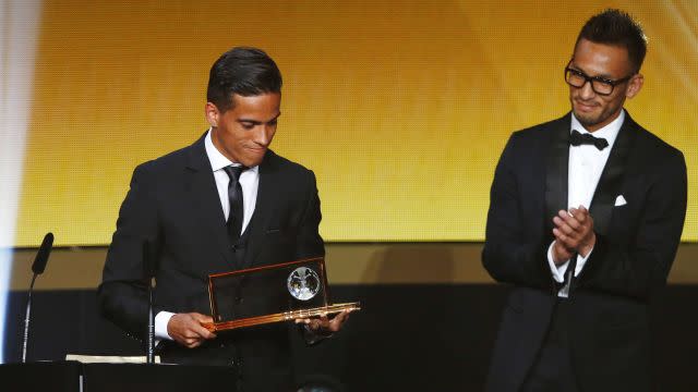 Goiano's Lira of Brazil holds the Puskas Award for Best Goal during the FIFA Ballon d'Or 2015 ceremony in Zurich