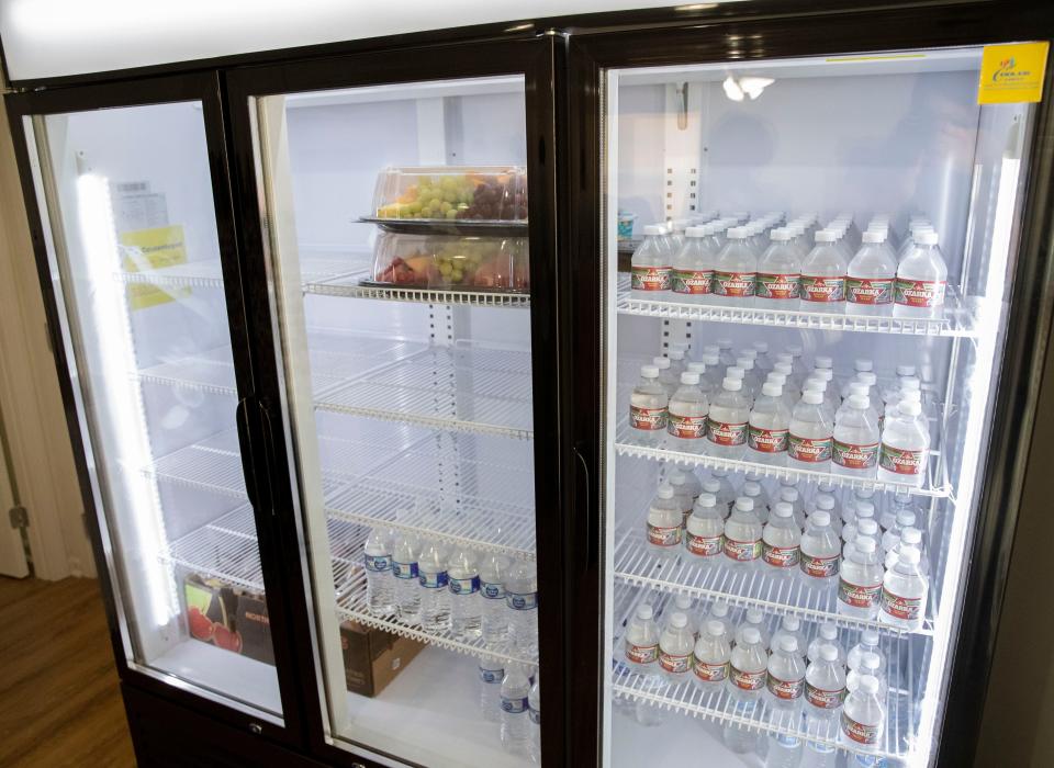 A fridge is partially stocked at a celebration for the new The Original Project Team sustainability hub Friday, July 1, 2022, at 2854 Douglass Avenue in Orange Mound. The location will feature food distribution, garden and a place to educate on home gardening.