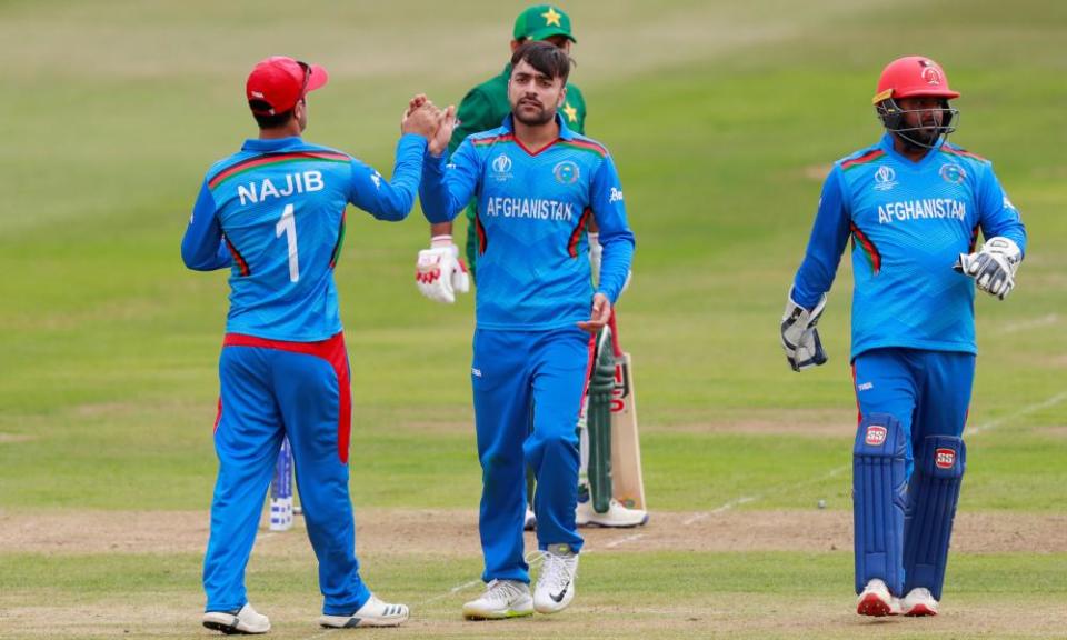 Afghanistan’s Rashid Khan (centre) celebrates a wicket during Friday’s win over Pakistan.