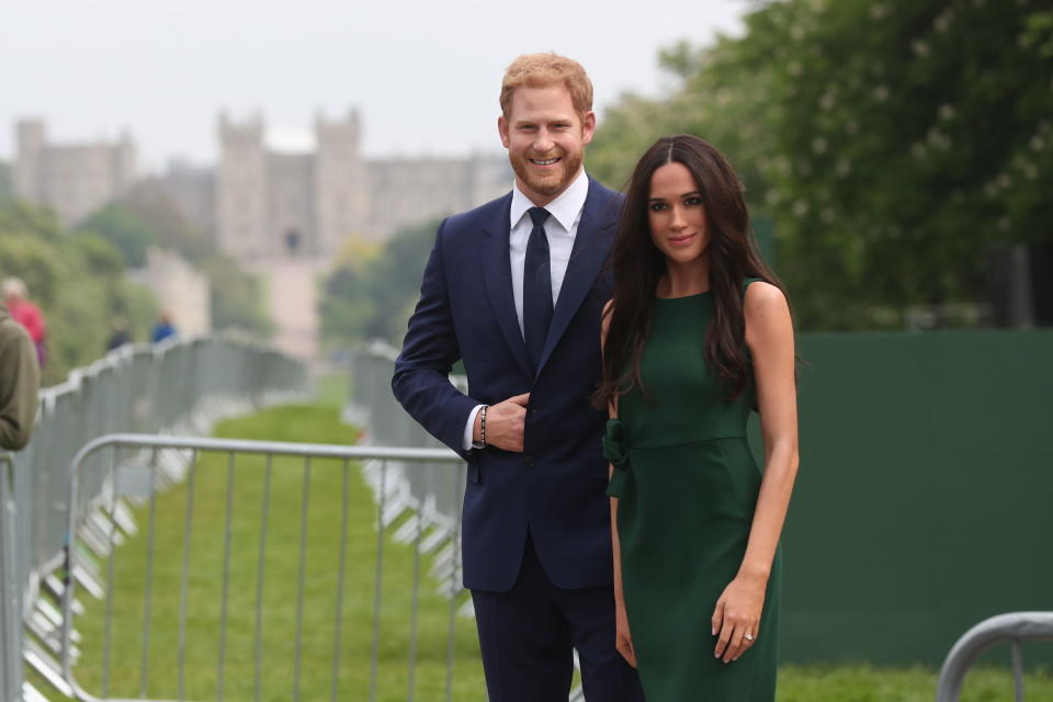 People got a sneak peek at the couple via some convincing waxworks (PA)