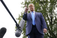 President Donald Trump speaks to members of the press on the South Lawn of the White House in Washington, Thursday, Sept. 24, 2020, before boarding Marine One for a short trip to Andrews Air Force Base, Md. Trump is traveling to North Carolina and Florida. (AP Photo/Patrick Semansky)
