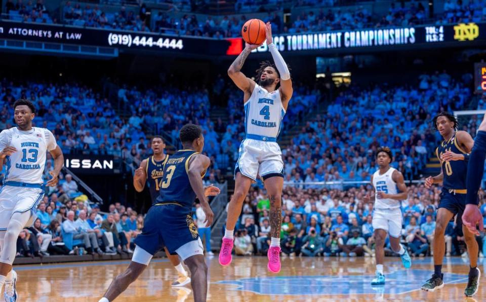 North Carolina’s R.J. Davis (4) launches a three point shot against Notre Dame during the first half on Tuesday, March 5, 2023 at the Smith Center in Chapel Hill, N.C.