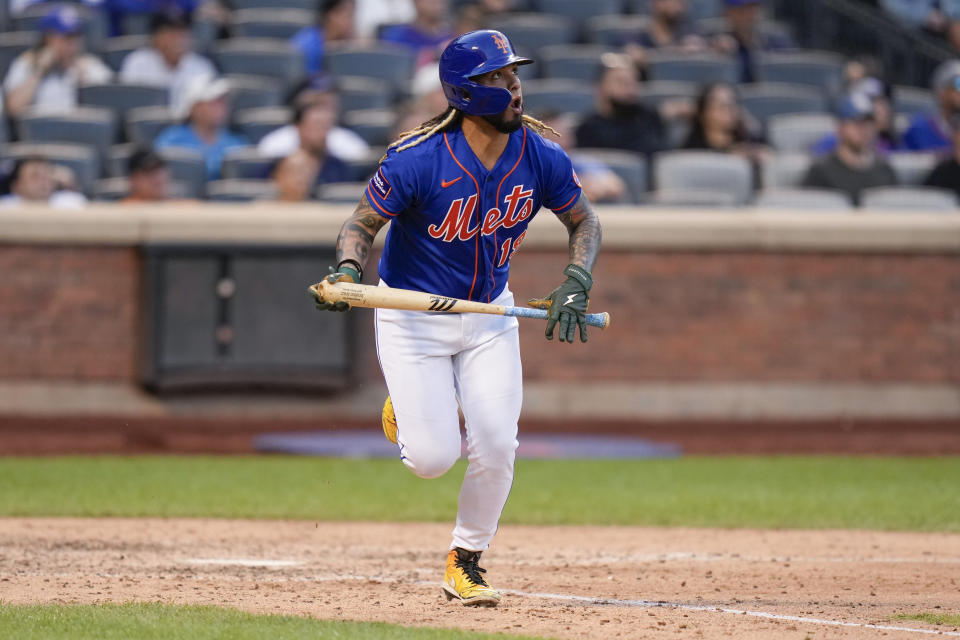 New York Mets' Jonathan Arauz watches his three-run home run against the Arizona Diamondbacks during the eighth inning of a baseball game Thursday, Sept. 14, 2023, in New York. (AP Photo/Seth Wenig)