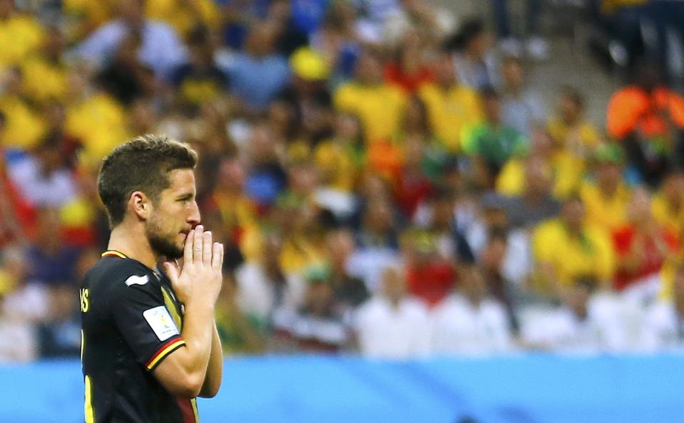 Belgium's Dries Mertens reacts after missing his goal shot during the 2014 World Cup Group H soccer match between Belgium and South Korea at the Corinthians arena