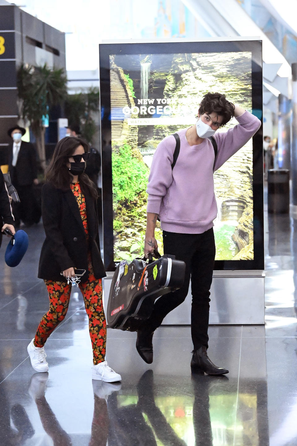 Shawn Mendes and Camila Cabello arrive at JFK International Airport in New York City. - Credit: Elder Ordonez / SplashNews.com