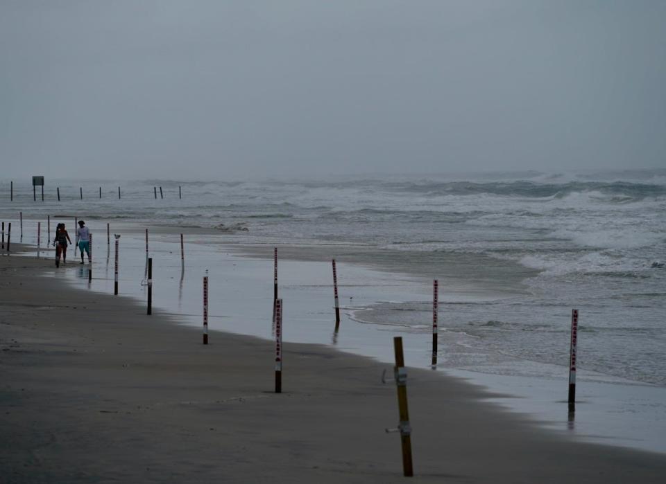Tides rise along an empty shoreline as the outer bands of Hurricane Idalia reach the Daytona Beach Boardwalk. The storm's impact in Volusia and Flagler was relatuvely minor, according to early reports.