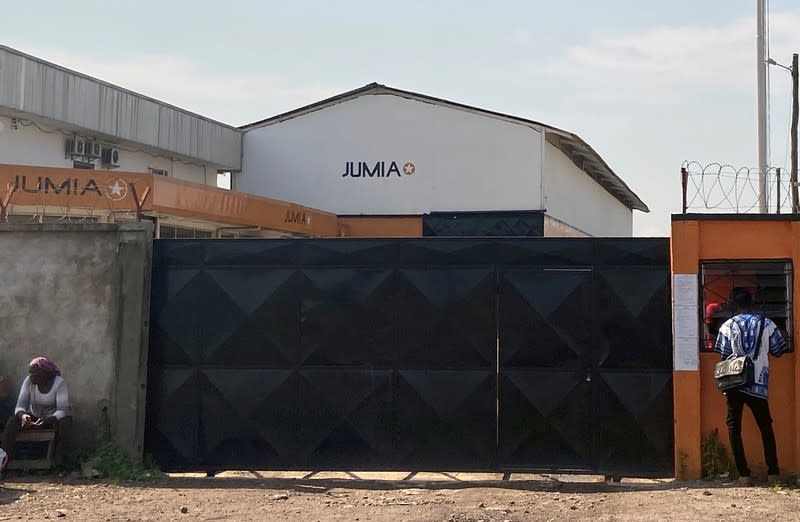 People are seen outside Jumia Technologies headquarters in Douala