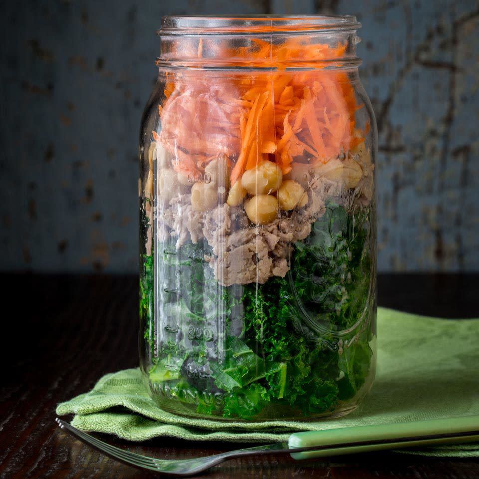 <p>This power salad will keep you fueled for hours, thanks to 26 grams of protein and 8 grams of fiber. Tossing the dressing and kale, and then letting it stand in the jar, softens it enough so you don't need to massage or cook it to make it tender. <a href="https://www.eatingwell.com/recipe/263360/mason-jar-power-salad-with-chickpeas-tuna/" rel="nofollow noopener" target="_blank" data-ylk="slk:View Recipe" class="link ">View Recipe</a></p>