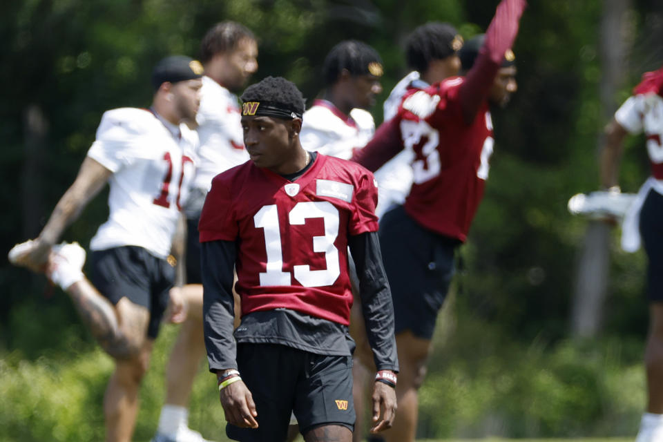 Washington Commanders cornerback Emmanuel Forbes Jr. (13) stands on the field during Commanders rookie minicamp at Commanders Park. Mandatory Credit: Geoff Burke-USA TODAY Sports