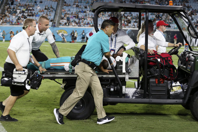 Daewood Davis: Miami Dolphins player 'has movement in all extremities'  after injury that led to suspension of game against Jacksonville Jaguars