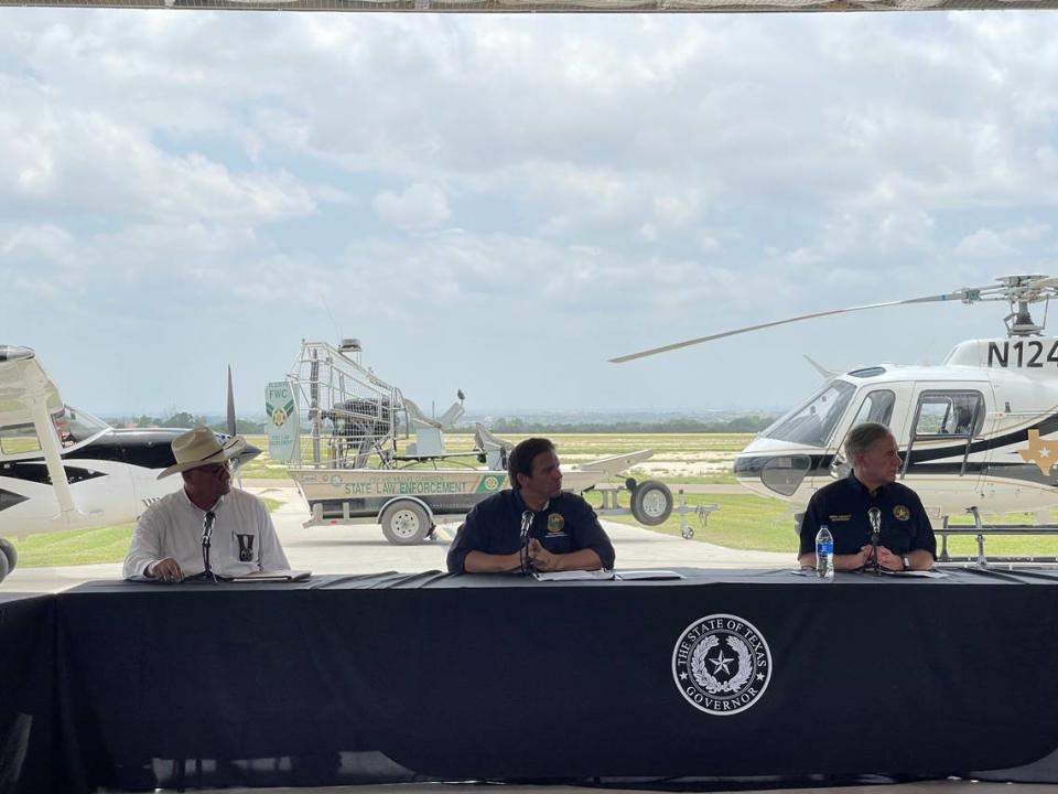 Florida Gov. Ron DeSantis and Texas Gov. Greg Abbott hold a press conference in Del Rio, Texas, to talk about a three-week effort by a contingent of Florida law enforcement officers to help enforce the U.S.-Mexico border.