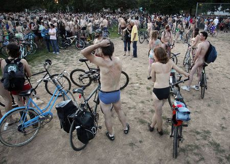 Cyclists prepare to pour into the streets of Portland for the 11th annual World Naked Bike Ride June 7, 2014. REUTERS/Steve Dipaola