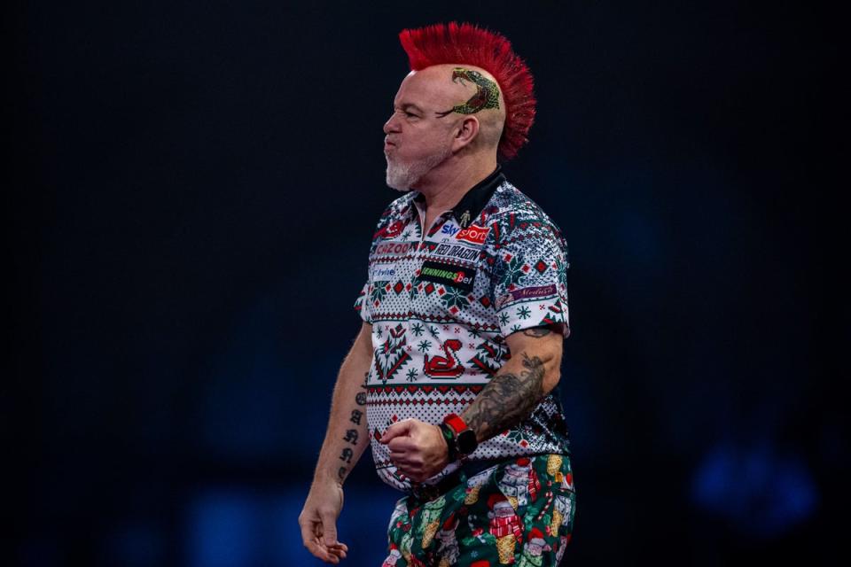 Peter Wright saw his hopes of retaining his PDC World Championship title end with defeat to Kim Huybrechts (Steven Paston/PA) (PA Wire)