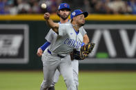 Chicago Cubs' Christopher Morel fields a ground out hit by Arizona Diamondbacks' Gabriel Moreno during the fifth inning of a baseball game, Monday, April 15, 2024, in Phoenix. (AP Photo/Matt York)