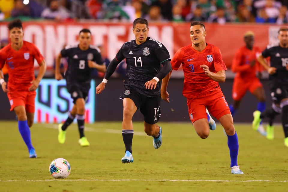 EAST RUTHERFORD, NJ - SEPTEMBER 06:  Mexico forward Javier Hernandez (14) battles United States defender Aaron Long (3) during the second  half of the International Friendly soccer game between the the United States and Mexico on September 6, 2019 at LetLife Stadium in East Rutherford, NJ.  (Photo by Rich Graessle/Icon Sportswire via Getty Images