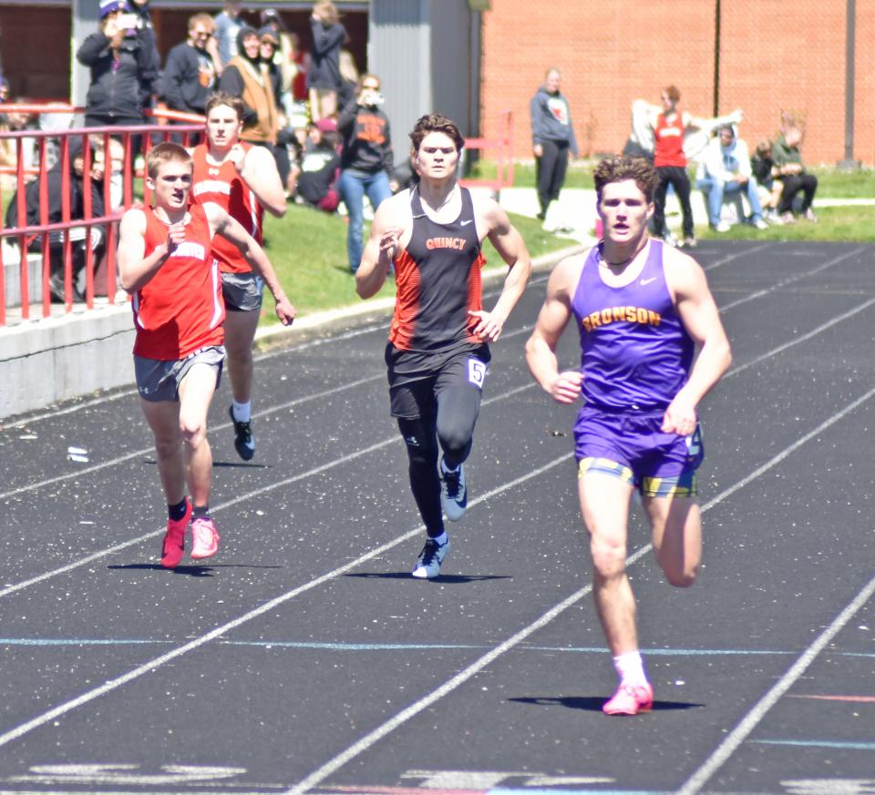 Bronson's Boston Bucklin leads the pack to the line during the 400 meter dash on Saturday