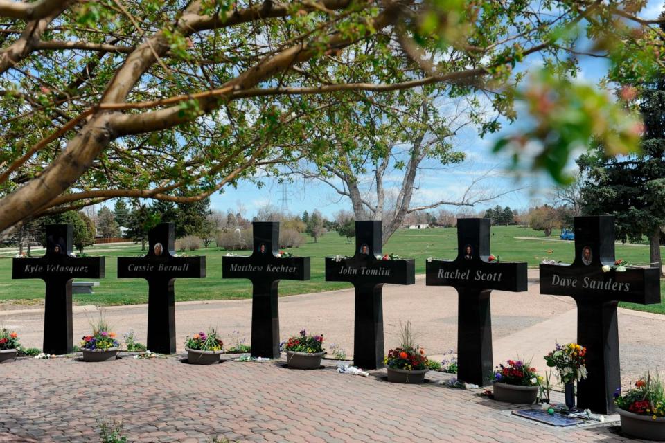 PHOTO: Crosses with the names and portraits of the victims of the 1999 Columbine High School massacre are seen at the Chapel Hill Memorial Gardens in Littleton, Colorado, April 20, 2019.  (Jason Connolly/AFP via Getty Images)