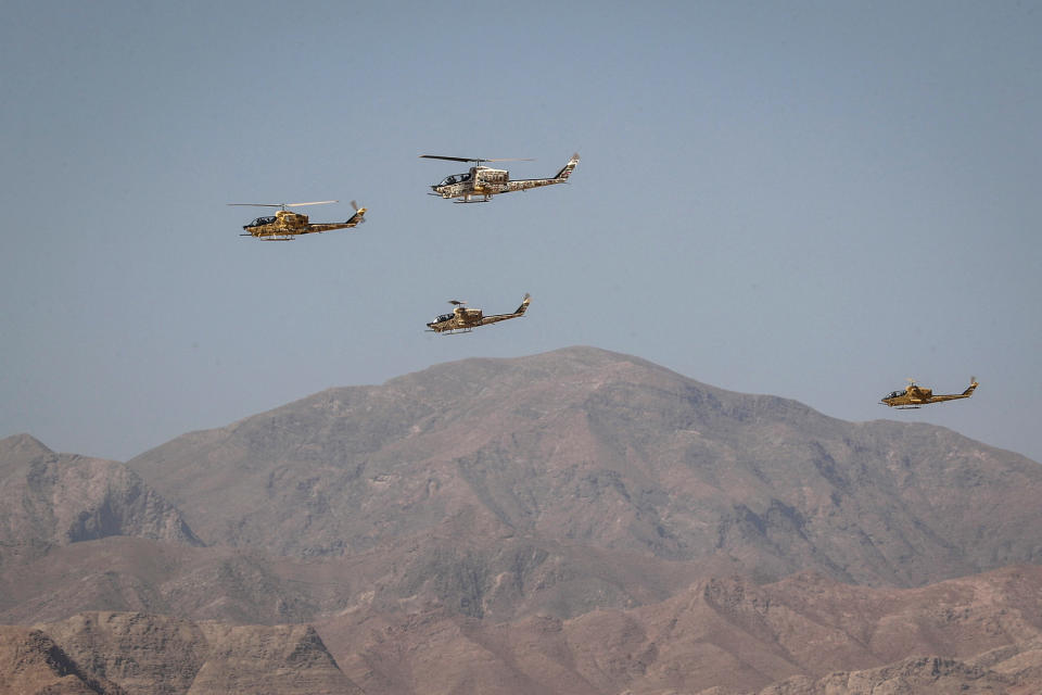 Helicopters fly during a military exercise in Isfahan, Iran, in this handout image obtained on September 8, 2022. Iranian Army/WANA (West Asia News Agency)/Handout via REUTERS ATTENTION EDITORS - THIS IMAGE HAS BEEN SUPPLIED BY A THIRD PARTY.