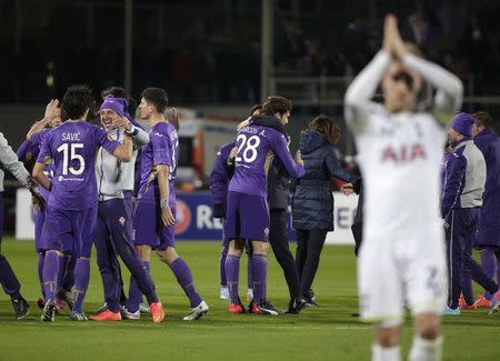 Fiorentina's players celebrate at the end of their Europa League round of 32 second leg soccer match against Tottenham Hotspur at the Artemio Franchi stadium in Florence February 26, 2015. REUTERS/Max Rossi