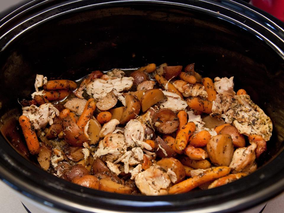 chicken stew with carrots cooking in the slow cooker