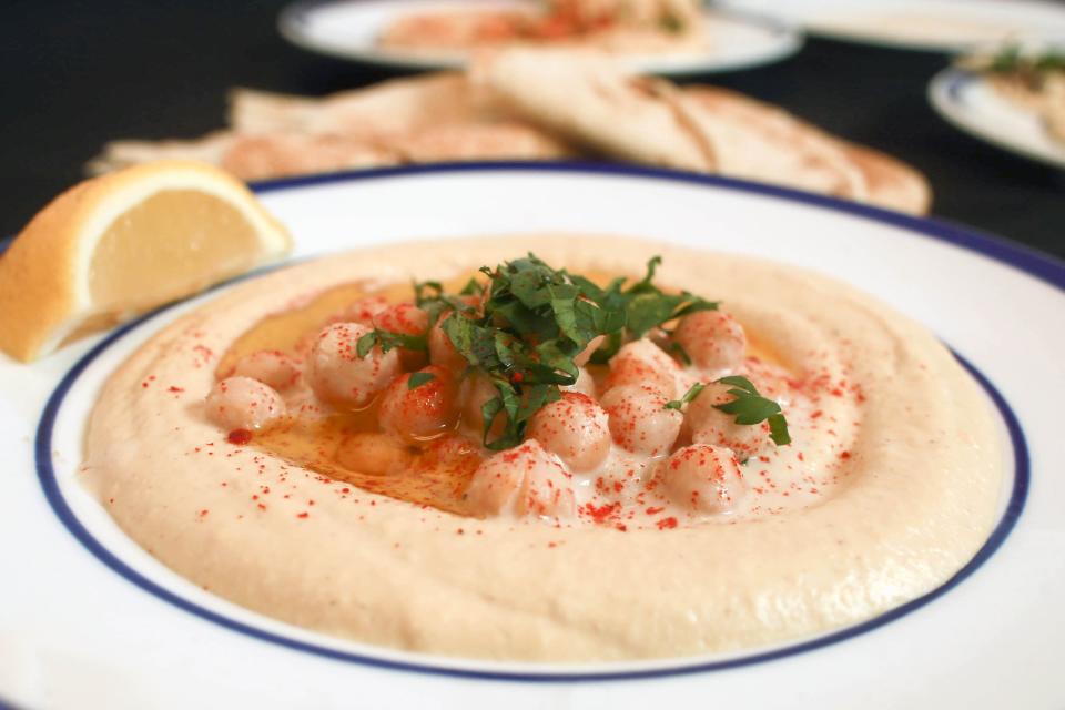 A dish of creamy hummus made by Michael Solomonov and Steven Cook. (Photo: Andrew Francis Wallace via Getty Images)