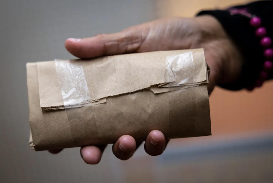 Polk shows a nondescript package containing 12 free condoms available for anyone at the Jasper Newton County Public Health District clinic. (Annie Mulligan / The Texas Tribune)