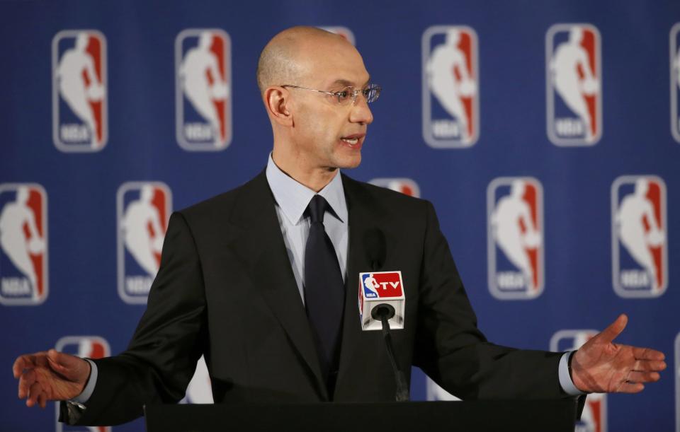 NBA Commissioner Adam Silver speaks at a news conference in New York April 29, 2014. Silver announced that Los Angeles Clippers owner Donald Sterling was banned for life and heavily fined by the NBA on over racist comments he made. REUTERS/Mike Segar (UNITED STATES - Tags: SPORT BASKETBALL)