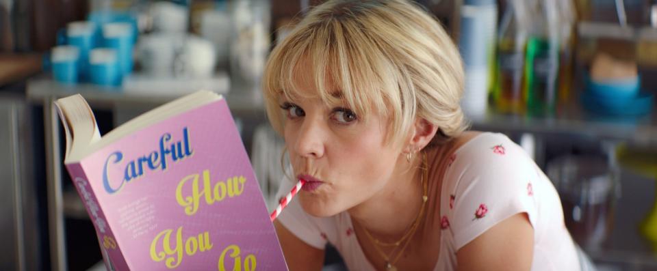 A woman reads a book