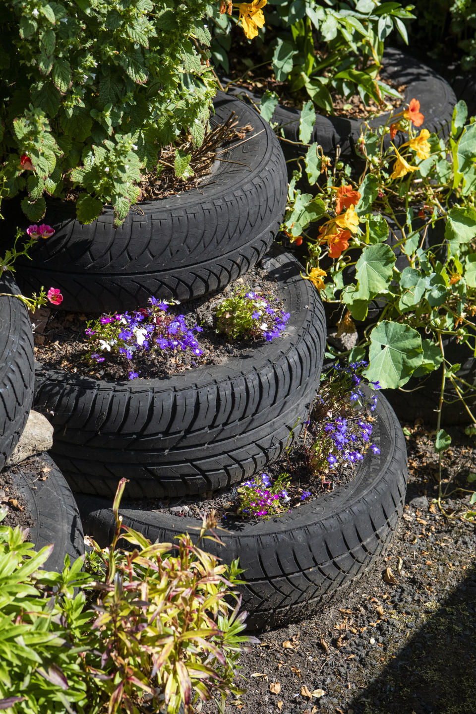 She also made a pond from old tyres. (SWNS)