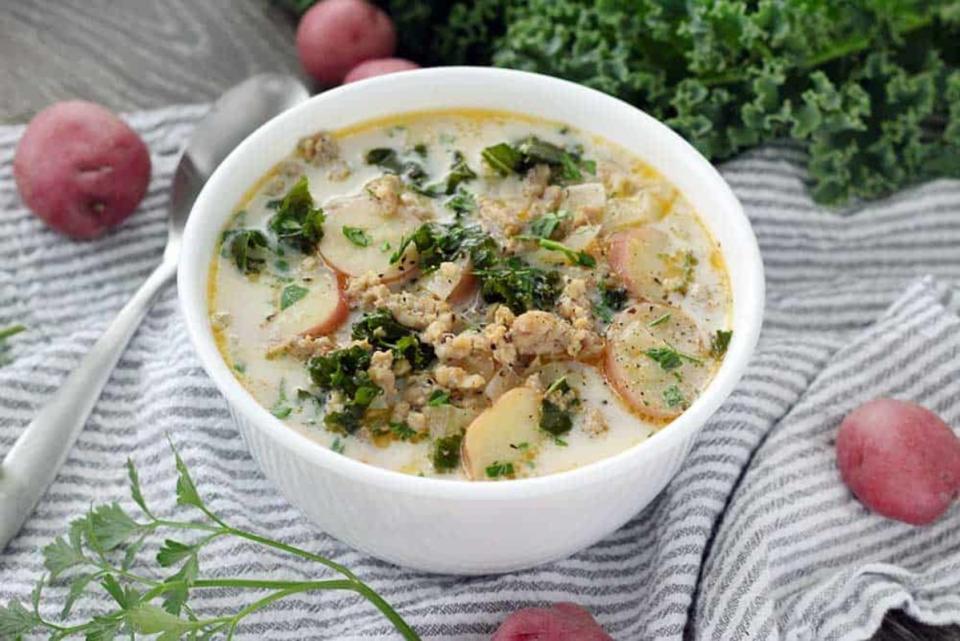 Bowl of Delicious<p>The famous Zuppa Toscana in an easy, homemade version! You can prepare this delicious, comforting copycat Olive Garden soup in about 45 minutes.</p><p><strong>Get the recipe: <a href="https://www.bowlofdelicious.com/olive-garden-zuppa-toscana/" rel="sponsored" target="_blank" data-ylk="slk:Zuppa Toscana (Copycat Olive Garden Soup);elm:context_link;itc:0;sec:content-canvas" class="link ">Zuppa Toscana (Copycat Olive Garden Soup)</a></strong></p>