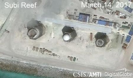 Construction is shown on Subi Reef, in the Spratly Islands, the disputed South China Sea in this March 14, 2017 satellite image released by CSIS Asia Maritime Transparency Initiative at the Center for Strategic and International Studies (CSIS) to Reuters on March 27, 2017. MANDATORY CREDIT CSIS/AMTI DigitalGlobe/Handout via REUTERS