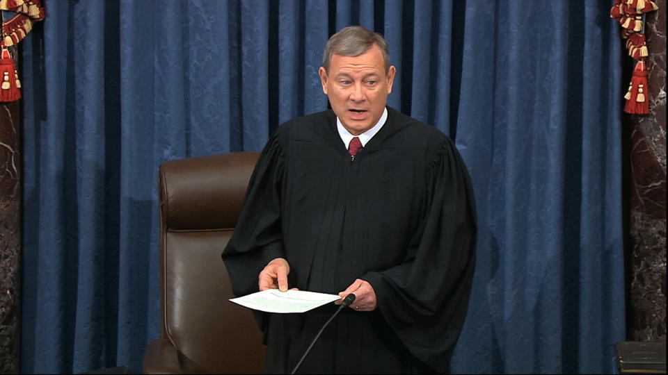 In this image from video, presiding officer Supreme Court Chief Justice John Roberts swears in members of the Senate for the impeachment trial against President Donald Trump at the U.S. Capitol in Washington, Thursday, Jan. 16, 2020. (Senate Television via AP)