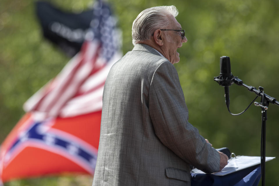 Jack Roberts, pastor of Maryville Baptist Church which has continued holding in-person church services during the COVID-19 pandemic, speaks during the Kentucky Freedom Rally at the state Capitol in Frankfort, Ky., Saturday, May 2, 2020. (Ryan C. Hermens/Lexington Herald-Leader via AP)
