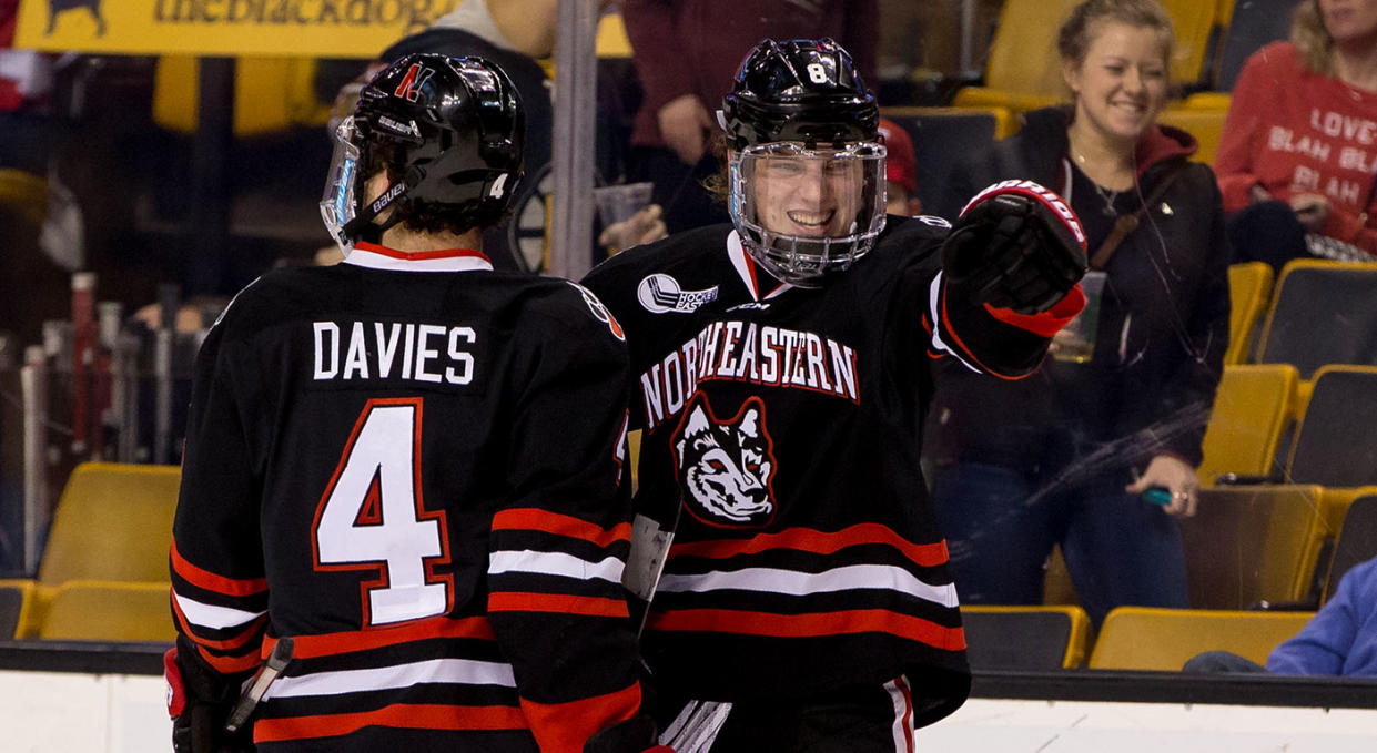 Adam Gaudette (right) of the Northeastern Huskies celebrates a goal with teammate Jeremy Davies (left). (Richard T Gagnon/Getty Images)