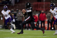 Cincinnati quarterback Desmond Ridder carries the ball during the first half of the team's NCAA college football game against East Carolina, Friday, Nov. 13, 2020, in Cincinnati. (AP Photo/Aaron Doster)