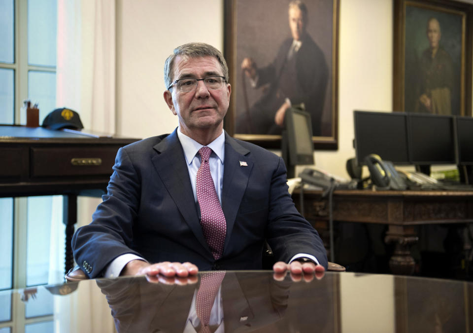 FILE - Secretary of Defense Ash Carter is interviewed in his Pentagon office, Jan. 18, 2017. President Joe Biden and other past and present U.S. officials are honoring Ash Carter, the late defense secretary who opened the way for women to fight in combat and transgendered personnel to serve, at a memorial service Thursday., Jan. 12, 2023. Carter, 68, died in October of a heart attack. (AP Photo/Cliff Owen, File)