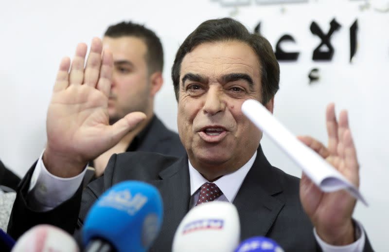 Lebanese Information Minister George Kordahi gestures during a news conference in Beirut